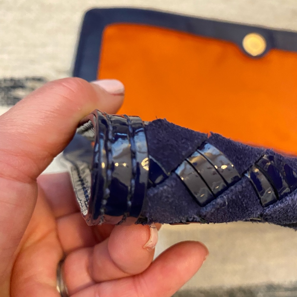 Cole Haan blue woven clutch with orange interior